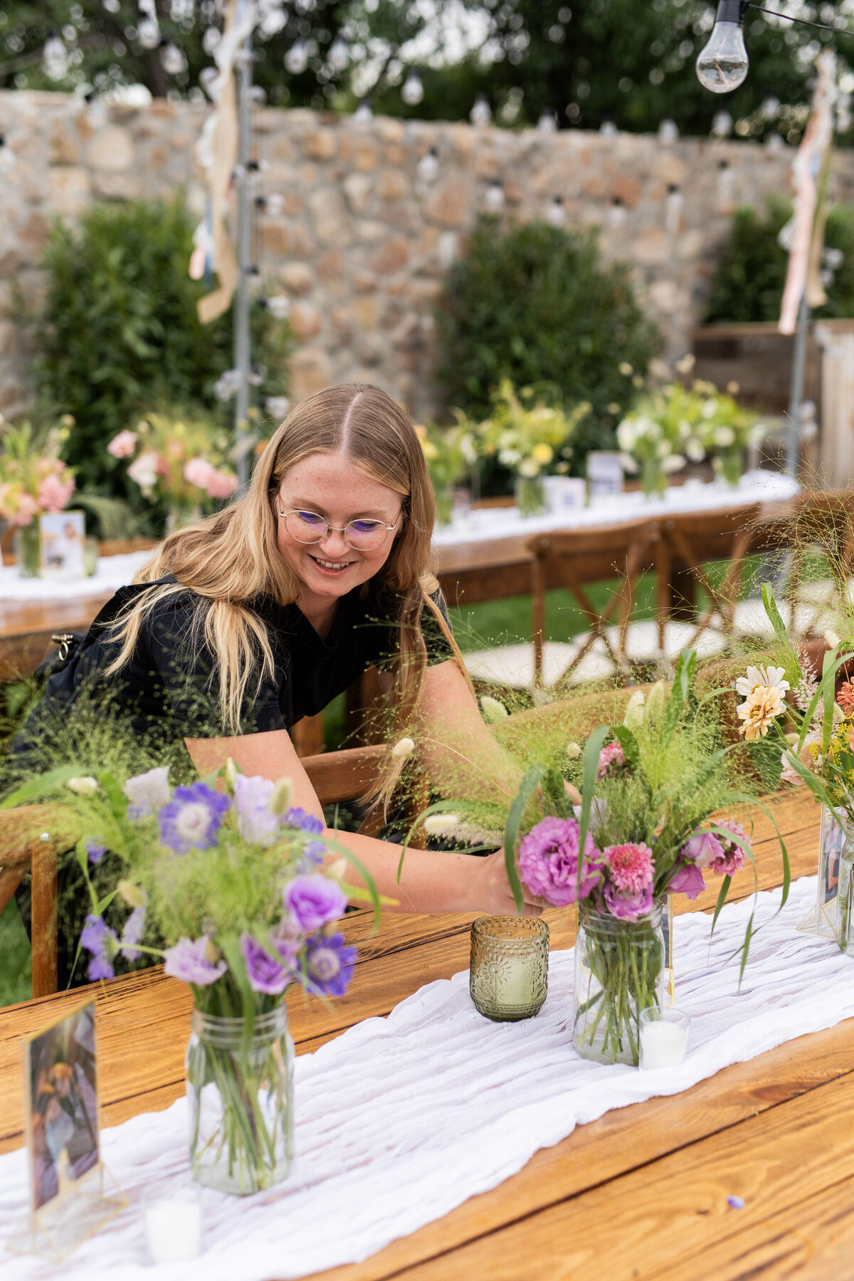 Utah County wedding florist arranging seasonal blooms